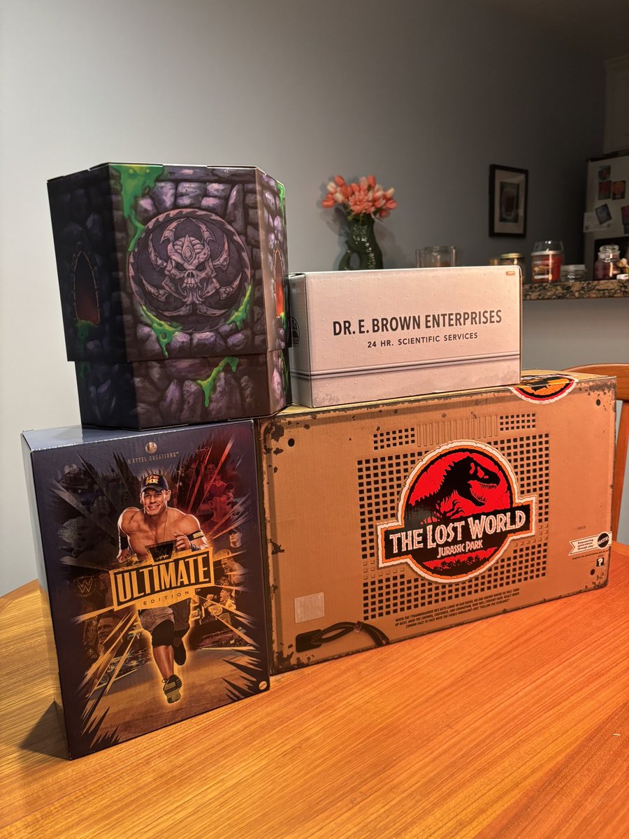 Wheeljack83's tweet image. Taking an early look at some of the SDCC 2025 Mattel Exclusives! Ultimate Edition John Cena, Jurassic Park Convention Crasher, Hot Wheels Back to the Future, and MOTU/TMNT Skele-Shredder! #SDCC2025 #WWE #Mattel #JohnCena #JurassicWorldRebirth