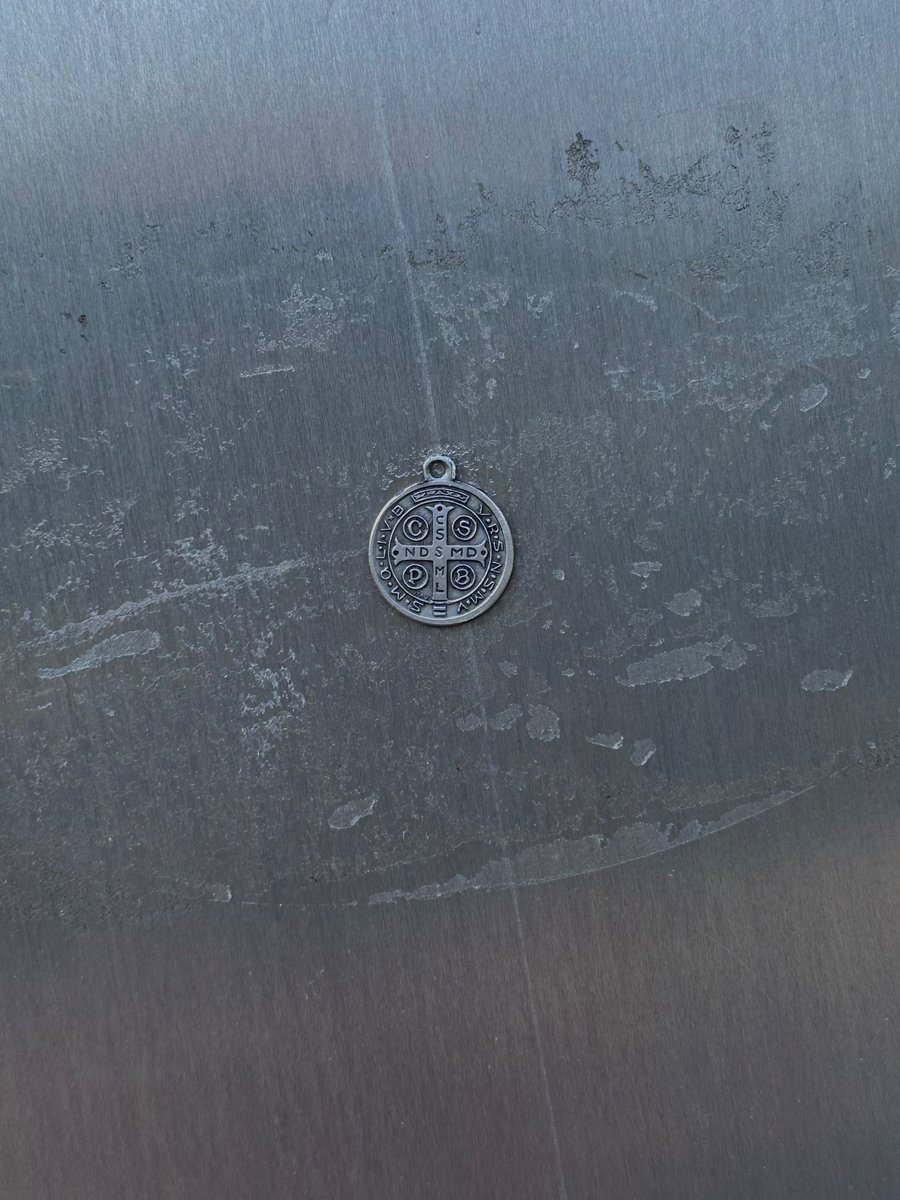 tomcontonio's tweet image. Someone keeps putting gross stickers on this sign; Saint Benedict, intercede for us!