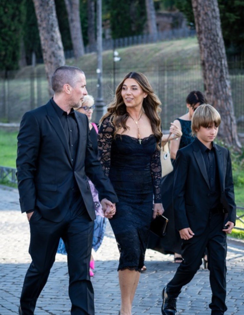 intobale's tweet image. Christian Bale at the Dolce and Gabbana Alta Moda couture show in Rome, Italy with his family.