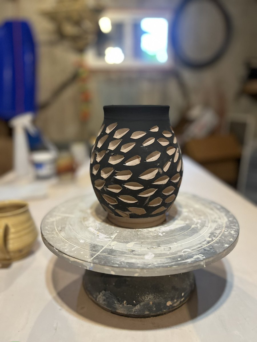 gaylestc's tweet image. I gotta say it takes a bit of courage to pick up a freshly thrown piece and start gouging chunks of it with a sharp blade. Here's to try new things and here's to lovely results.