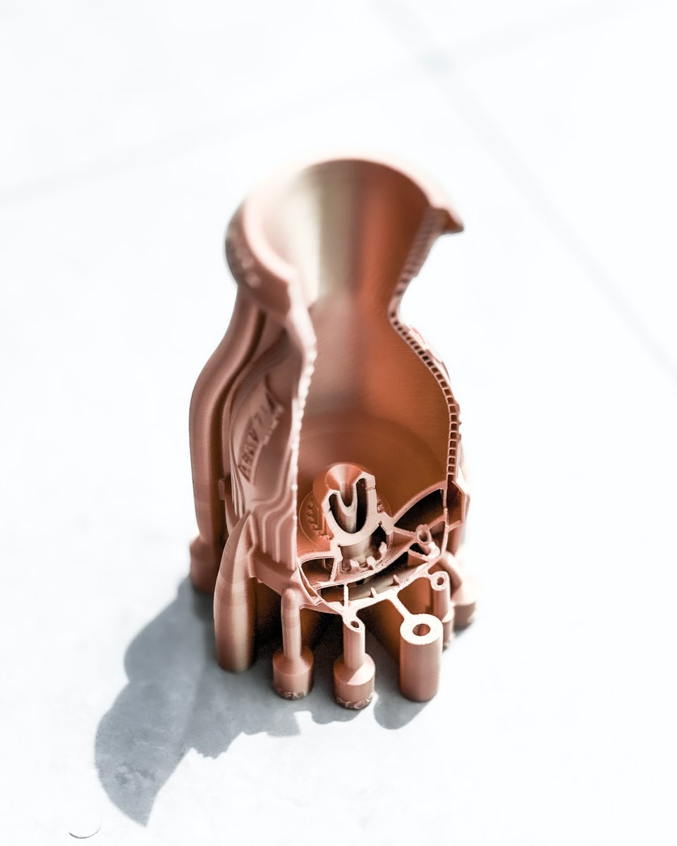 leap_71's tweet image. A compact 2kN KeroLOX rocket engine with a Pintle injector. Pintle injectors have advantages for small engines, especially for the deep throttling required for lunar landers. Generated autonomously by the Noyron Large Computational Engineering Model.