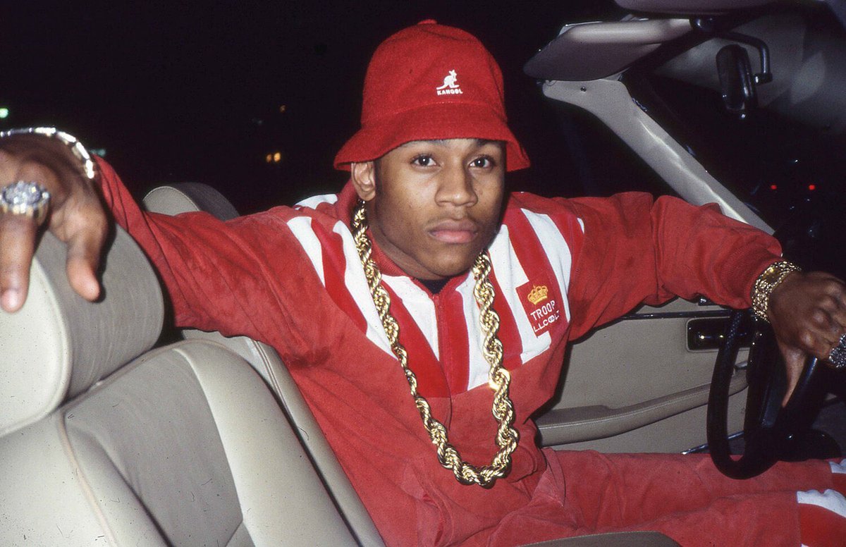 Reference points? 🤨 @TylerTheCreator

- 50 Cent's Get Rich Or Die Tryin' album cover
- LL Cool J rope chain, red hat with red pants
- Ludacris 'Get Back' music video