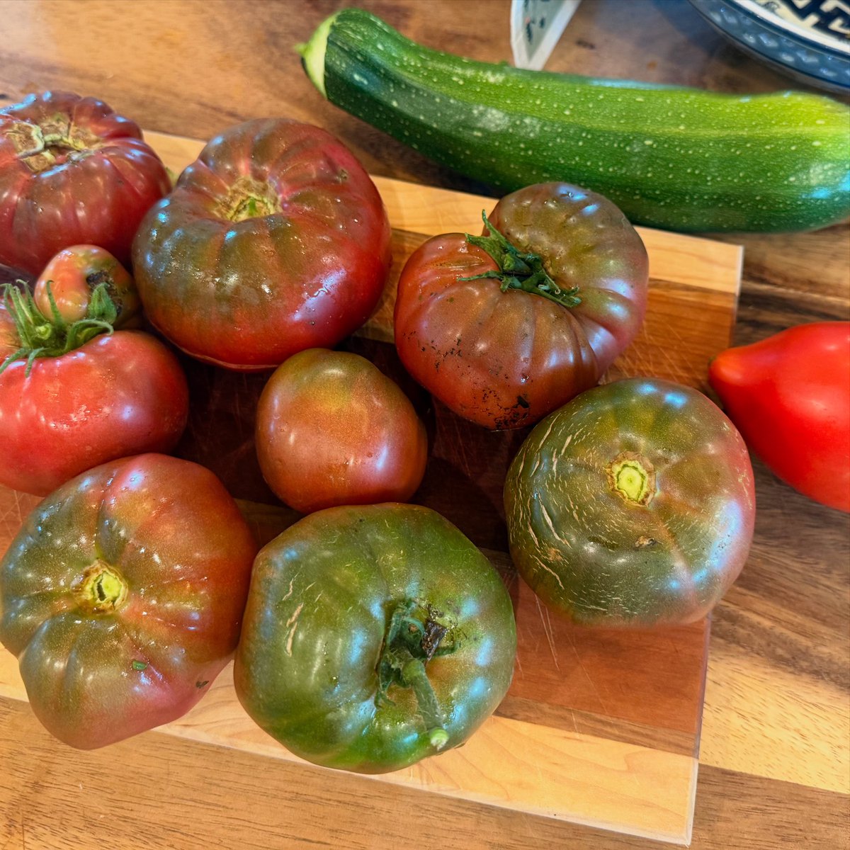 Every morning we pick a bunch of heirloom fruits and veggies. Those tomatoes would be 5 dollars each at an organic food store. We can get 100 a year from a single plant from a single seed. Each tomato has 100 seeds in it. You can preserve them by making sauce or canning. 
“The