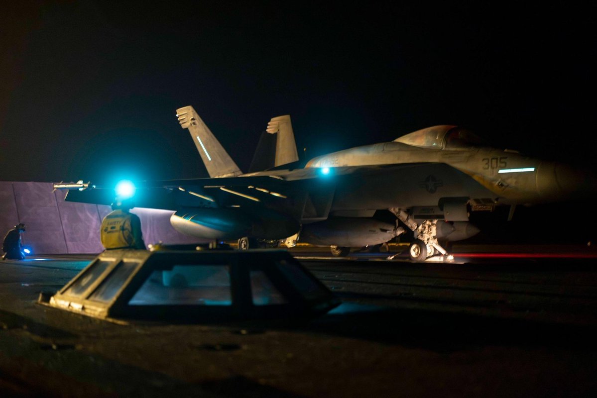 CENTCOM's tweet image. U.S. Sailors launch an F/A-18E Super Hornet from the deck of the USS Nimitz (CVN 68) during night time operations in the CENTCOM area of responsibility.