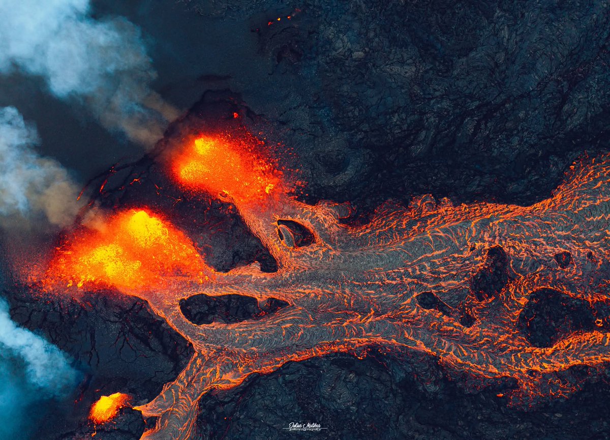 DWPippy's tweet image. Good morning!
Incredible overhead views of an active volcano and it's lava flow in Iceland photographed by Julius Matikas.