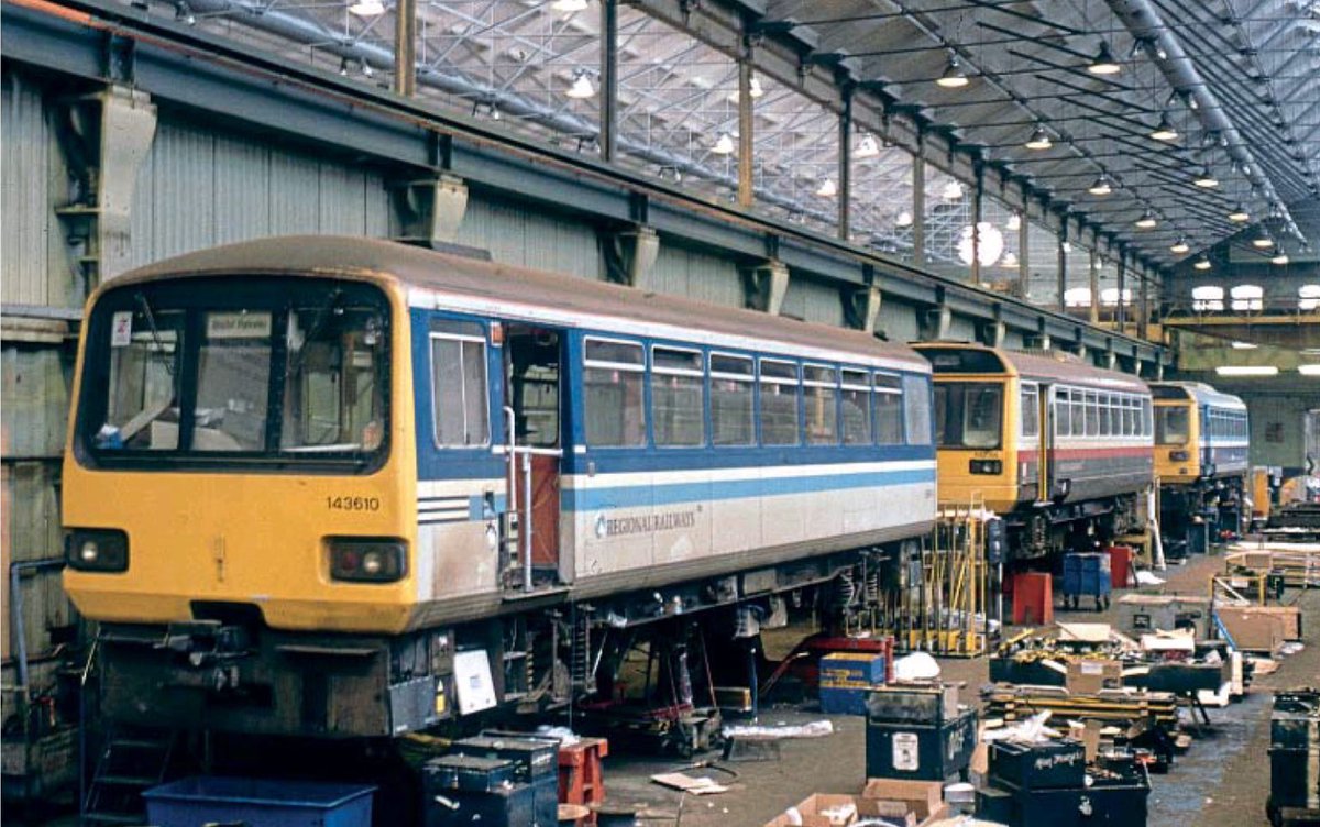 Elwick70's tweet image. Doncaster, 1995
Pacer vehicles at Doncaster Works. Half of 143610 in Regional Railways livery, a 142 in GMPTE grey, red and white, and a 142 in Provincial Services blue
📷 Unknown
