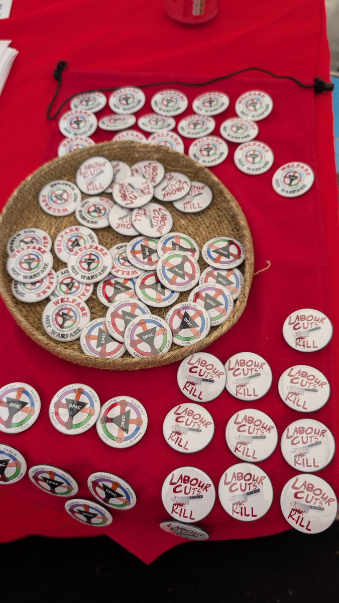 BenClaimant's tweet image. The @Dis_PPL_Protest stall is going down really well. We've been in another debate and did an open mic. The badges are going down really well.
#TolpuddleFestival