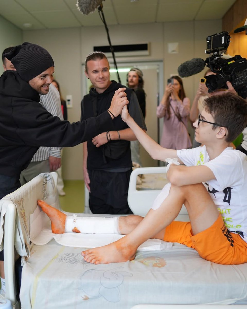 StratcomCentre's tweet image. Members of the Finnish band "The Rasmus" today visited the Okhmatdyt Children's Hospital in Kyiv, the scene of last year's brutal Russian missile attack.