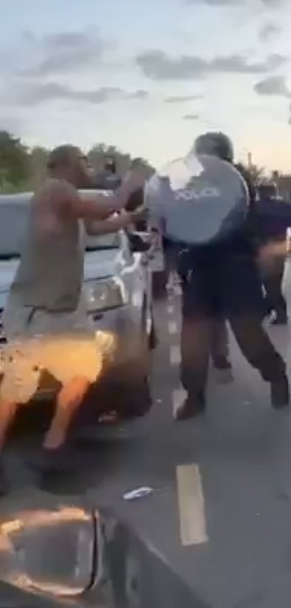 Here's some more footage of him protesting peacefully...