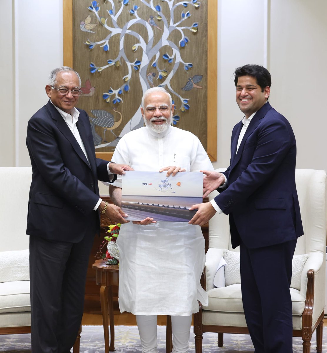 TVS Motor Presents Kutch Rann Utsav 2025 Coffee Table Book to PM Modi; PM Commends Effort