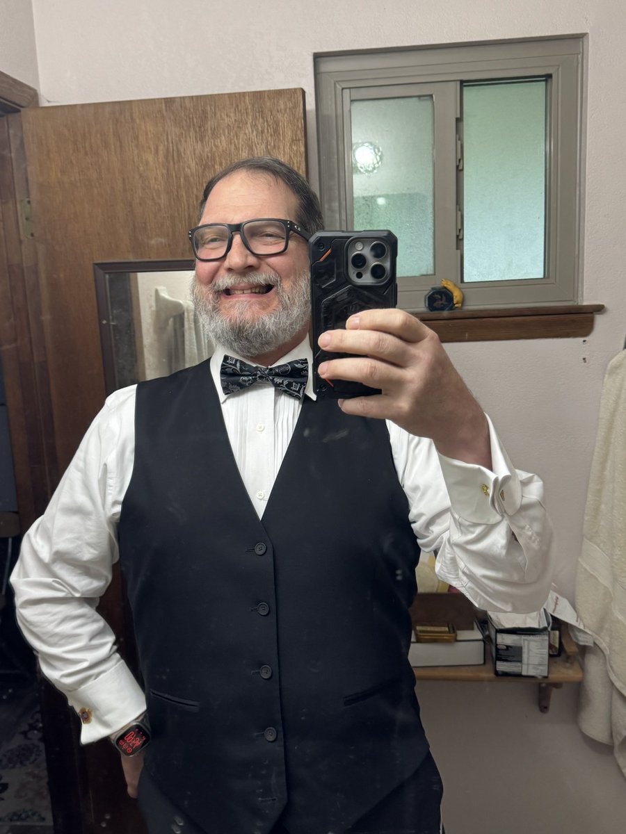 Getting ready for a meeting shortly. Attire for the meeting is a tux.