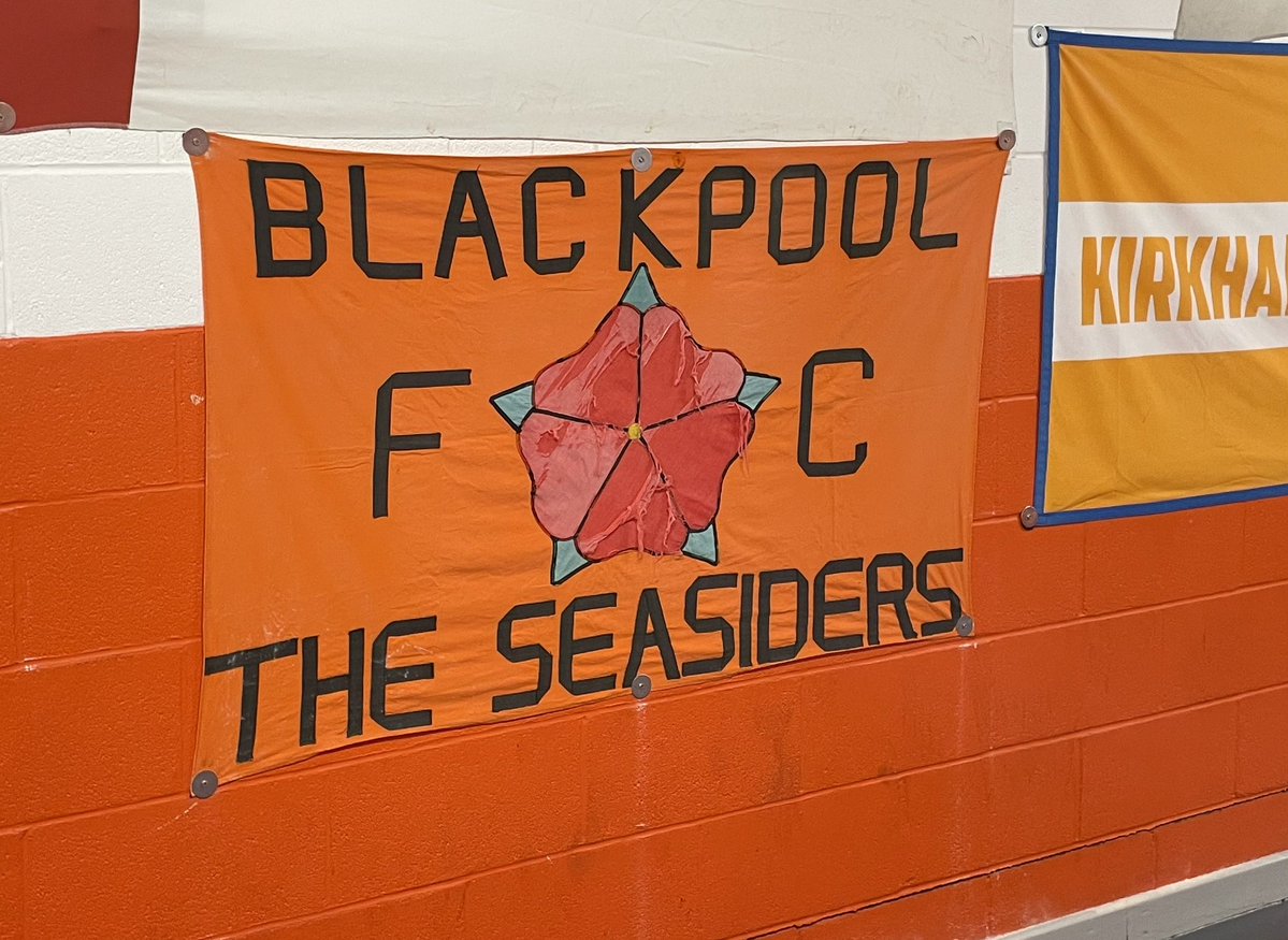 Made up with this! In 1995 my mum made a flag for my university bedroom wall! It’s battered now after 30 years and 4 years on the back of the North Stand but now inside on the North West concourse. Love it. It could tell some stories that flag! 😂🍊#utmp