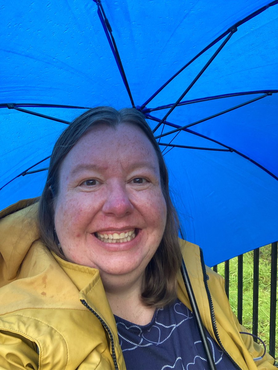 RuthBoreham's tweet image. This is the face of someone who is hot and sweaty but very grateful that the big umbrella was only needed to get to the start of where she was meeting people, and after she had left them and not actually during the 2 hour private women’s history walking tour she did today!