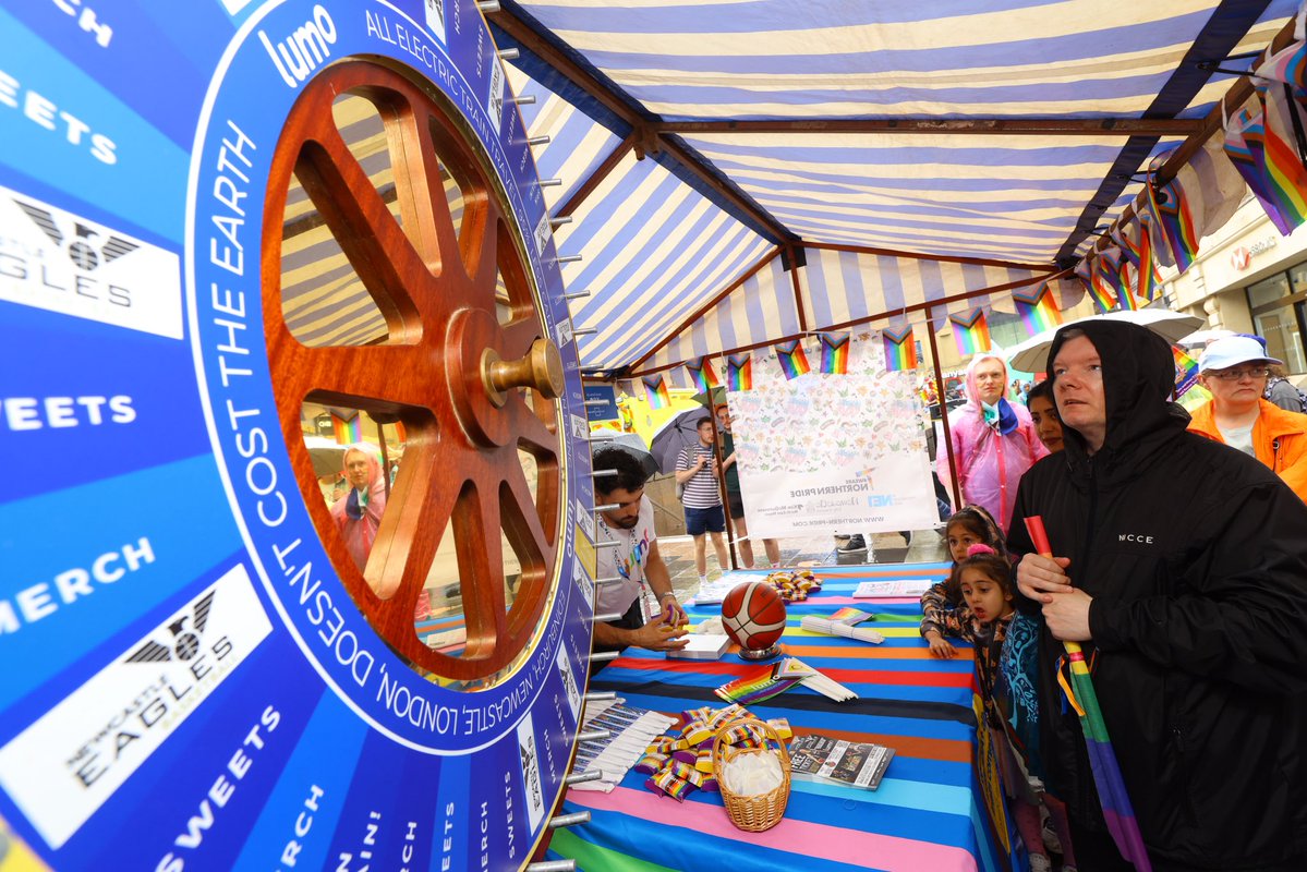 richardsalkeld's tweet image. Despite dark clouds and heavy rain, Newcastle was alive with colour today with people enjoying the @LumoTravel Platform stage for new talent and the market stall with @NewcastleEagle where hundreds of prizes were won on the Spin to Win wheel for @northernprideuk @cwaagency