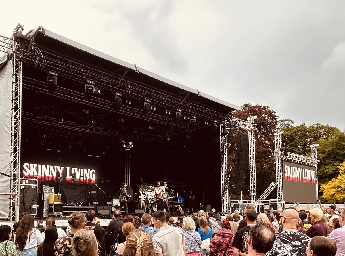 Great to be at an outdoor gig. Skinny living doing a good set. Awaiting @James Bay