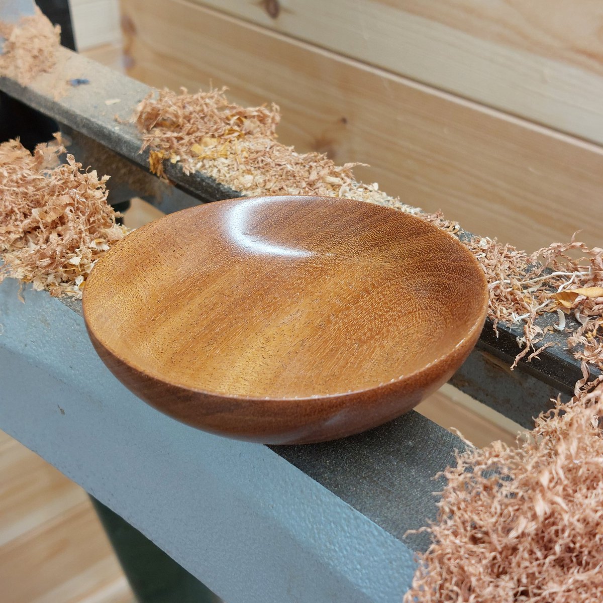 My first bowl, hence the first time using a bowl gouge 😬. Turning end grain is a different kettle of fish spindle turning, so I'm pleased it's turned out as well as it has. Made from Mahogany, from a recycled prison door (given to me by the fella I bought the lathe from).