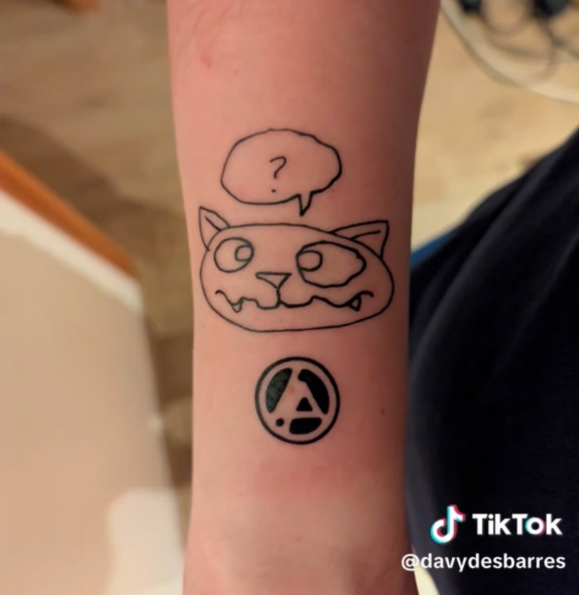 aaaand he really got it tattooed!🐱