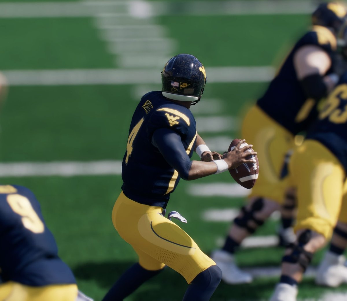 ethan_dimitroff's tweet image. Updating my 2012 @WVUfootball teambuilder. Adding all the decals to the back of the helmet. And the gold flake! Also corrected the gray helmet’s stripe. Still need to work on the gold flake on it.