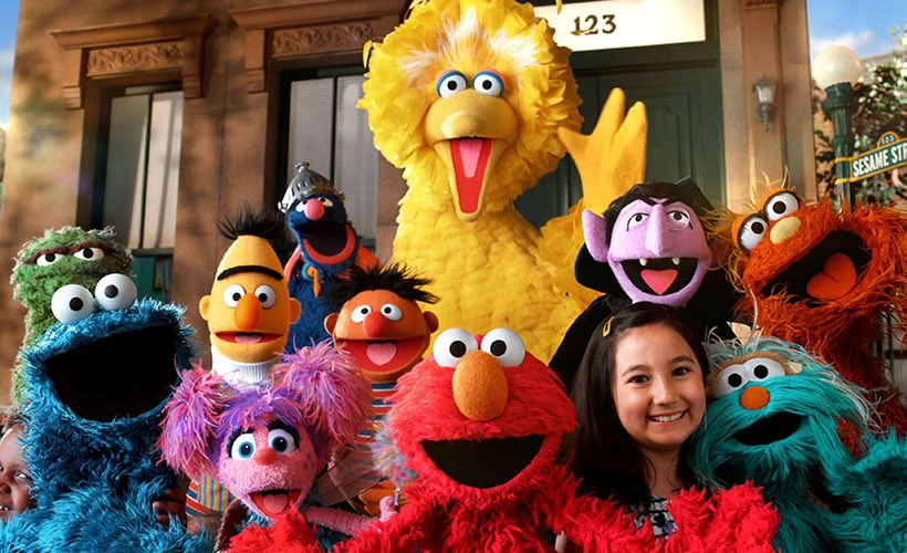 EJinAction's tweet image. “the way to sesame”
you ask me, child,
how to get to sesame street—
where colors danced
and kindness had feet,
where the alphabet sang
and monsters were sweet,
where every soft soul
had a front-row seat.
but they cut the cords,
closed the gate,
turned laughter
into a budget…