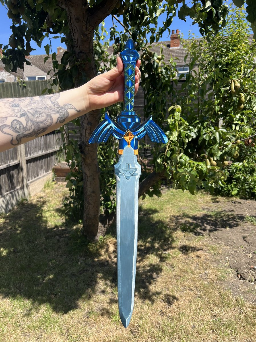 My sister made Charlotte a Zelda sword out of wood 🗡️