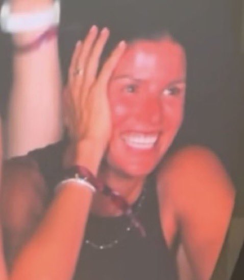 Roklawrence's tweet image. Was the woman at the Coldplay concert seen next to CEO Andy Byron and Kristin Cabot a mere bystander, or someone who knew more than she was letting on?