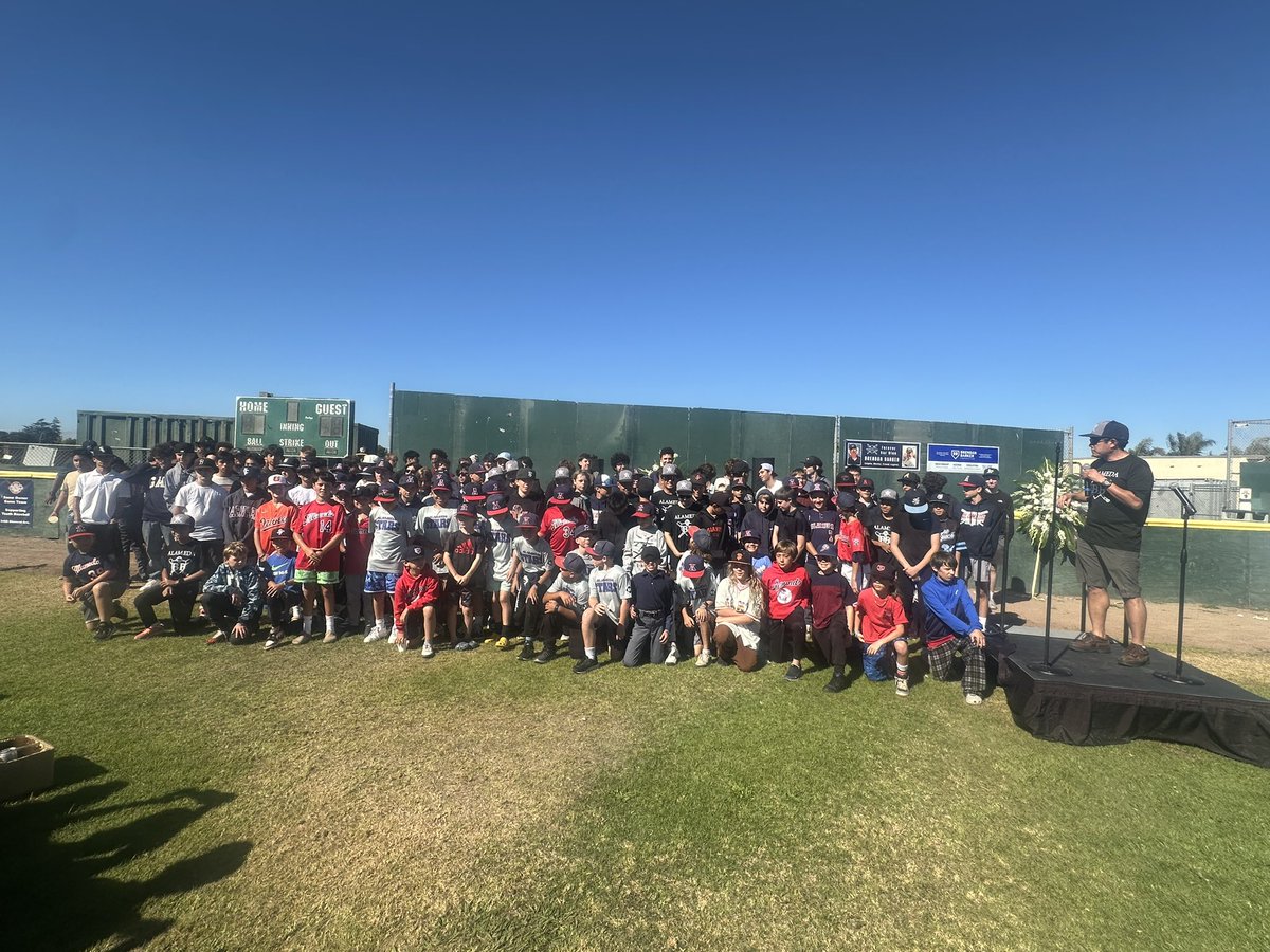 JanieMcCAP's tweet image. Clayton Woo, father of Mariners pitcher Bryan Woo, and Alameda Little Leaguers and their families pay tribute to beloved umpire Brendan Barker today on the very field where he poured out his heart and soul for years — sometimes calling five games a day.