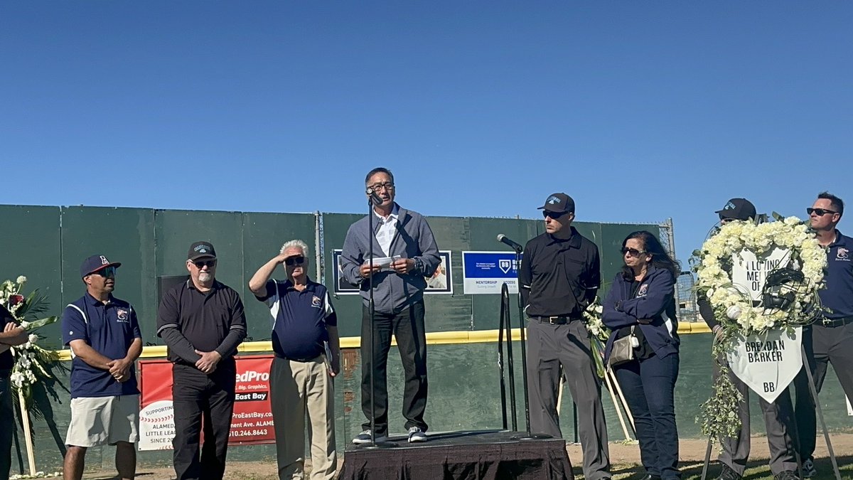 JanieMcCAP's tweet image. Clayton Woo, father of Mariners pitcher Bryan Woo, and Alameda Little Leaguers and their families pay tribute to beloved umpire Brendan Barker today on the very field where he poured out his heart and soul for years — sometimes calling five games a day.