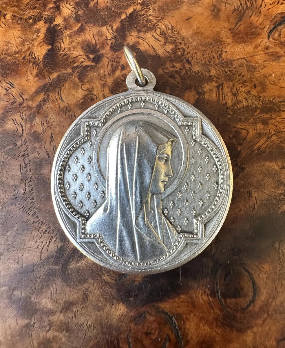 BenThePCGuy's tweet image. Should I buy these? I should probably buy these. Original set of sterling Mary & Jesus medals, c. 1850.