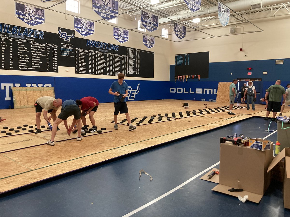 Huge thanks to our parents, wrestlers &amp; coaches who spent the day cutting, drilling, gluing &amp; moving to install a brand-new subfloor in the wrestling room! 💪

It adds safety, protection &amp; makes our room one of the best around. Thanks USD 231 we can’t wait to put it to use! 🔵⚪️