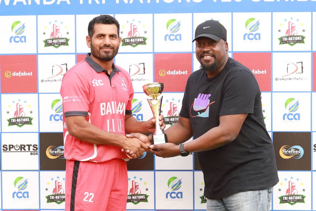 *Player of the Match – Asif Ali achieved 26 (25) with the bat and 2/20 in 4 overs, leading Bahrain to victory. In the frame: Asif receiving the award from former Busoga College Mwiri &amp; Uganda National team Captain Guy Lutaaya Kimbowa in Tri Nations Series2025 in Gahanga Kigali