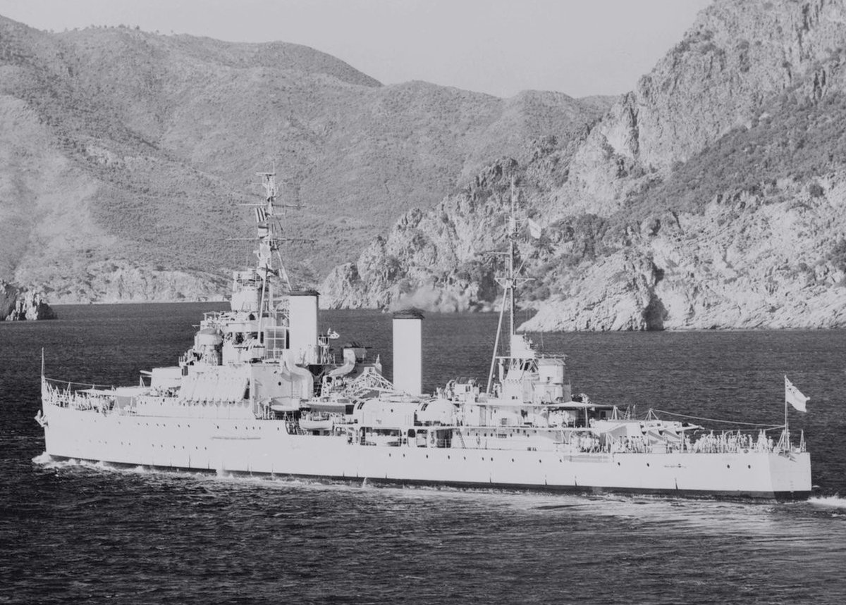 DramaWarship's tweet image. Date: July 13, 1950. Location: The Marmaris Harbour, Turkey. Event: Light cruiser Gambia is arriving in Marmaris at the beginning of her 5-year-long service with Royal Navy's Mediterranean Fleet. Current status: Scrapped in 1969-70, lifespan of 31 years.