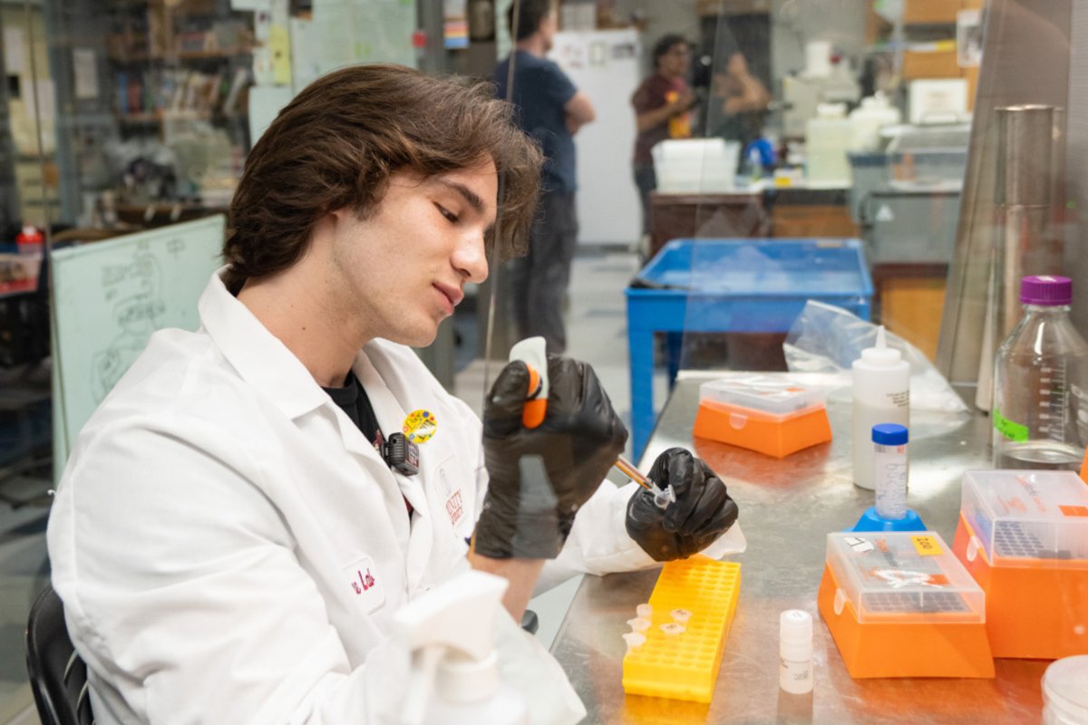 Trinity_U's tweet image. Luka Pravica ’26 and Hector Gonzalez ’26 are turning curiosity into innovation—one yeast cell at a time. This summer, this pair of biochemistry majors is working in biology professor Brian Teague’s lab to genetically engineer yeast that can convert lactose into ethanol.