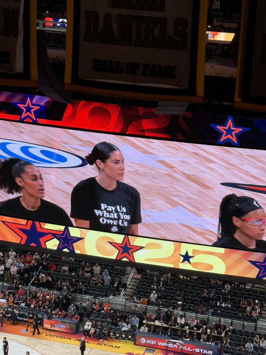 TheAmberHarding's tweet image. Gauntlet thrown.
WNBA All-Stars take the court wearing “Pay Us What You Owe Us” shirts. There’s a players union logo at the bottom.