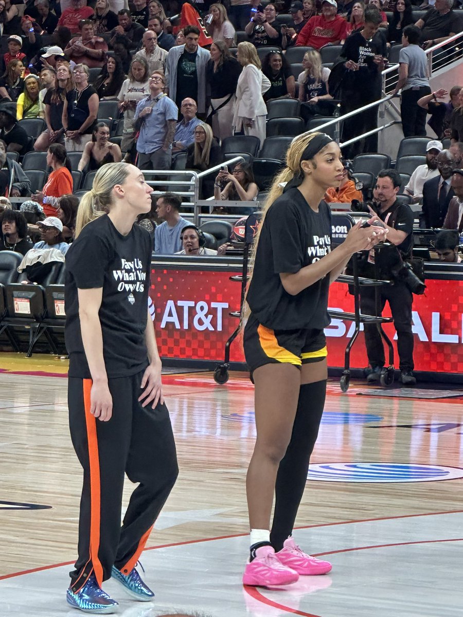 colincsalao's tweet image. WNBA All-Stars shirts under their warm-ups reads:
“Pay Us What You Owe Us.”