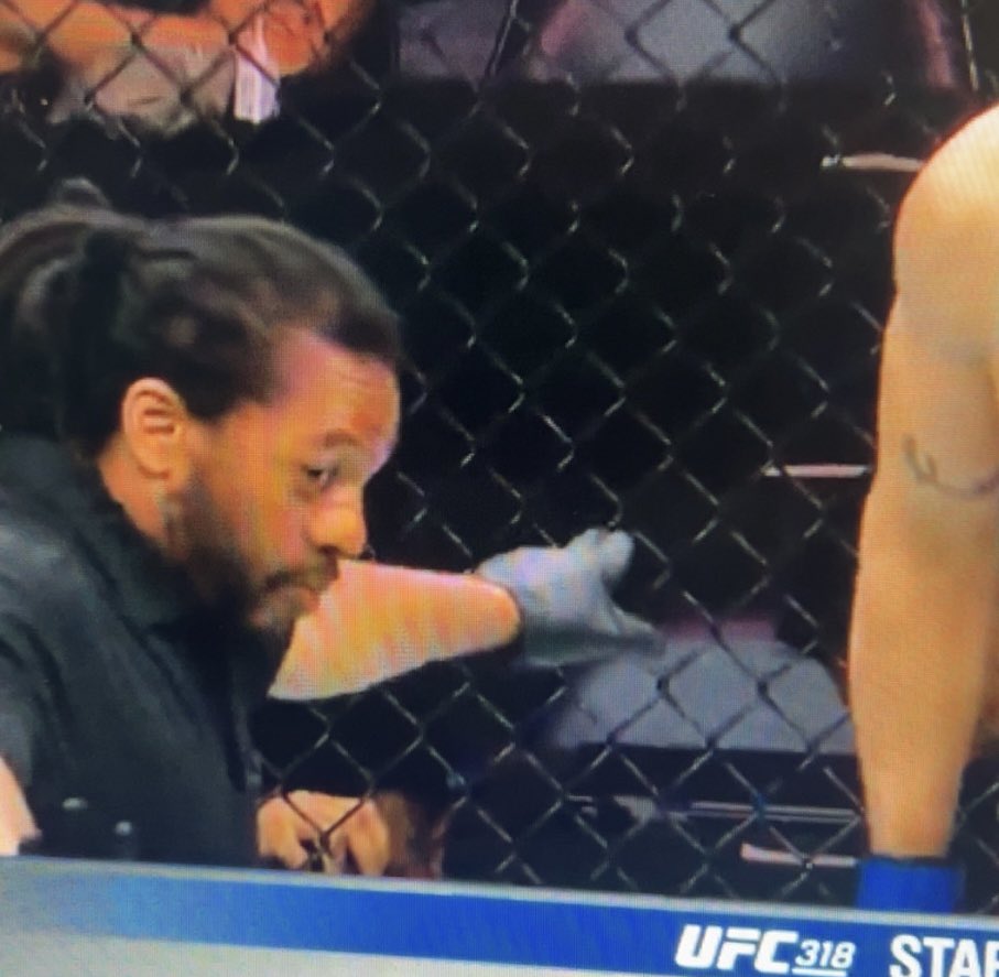 The look the gynaecologist gives me as he takes my wife into his office