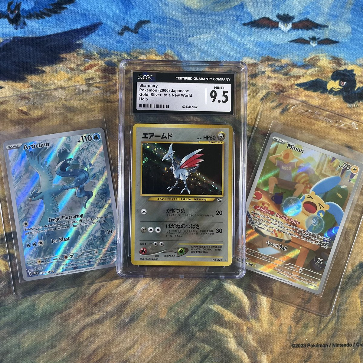 My pickups! Sold most of my modern raw cards to fund the next vintage pack and grabbed a few things for the collection. W show had a great day surrounded by shiny cardboard. The Skarmory by Ken Sugimori  😮‍💨 Classic.