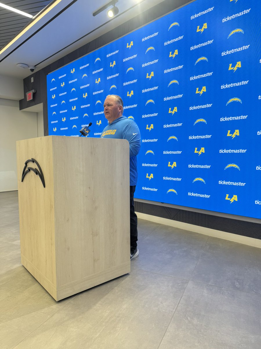 Joe Alt vs Greg Roman at the podium