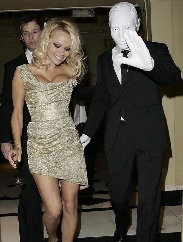 rogue's tweet image. In 2008, Pamela Anderson attended the Vivienne Westwood SS08 fashion show in London with a masked mystery date who many speculated was Michael Jackson in disguise