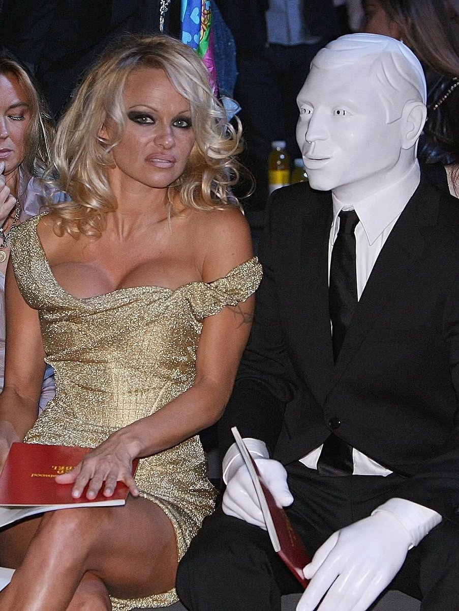 rogue's tweet image. In 2008, Pamela Anderson attended the Vivienne Westwood SS08 fashion show in London with a masked mystery date who many speculated was Michael Jackson in disguise