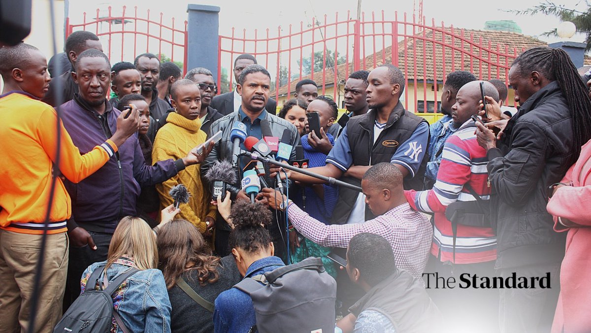 StandardKenya's tweet photo. Boniface Mwangi's lawyer, Njanja Maina; his wife, Hellen Njeri; Vocal Africa CEO, Hussein Khalid; and human rights activists address the media outside Pangani Police Station in Nairobi, where Mwangi is being held on terrorism charges.

Photos: Benard Orwongo https://t.co/QxL0SBVLWB