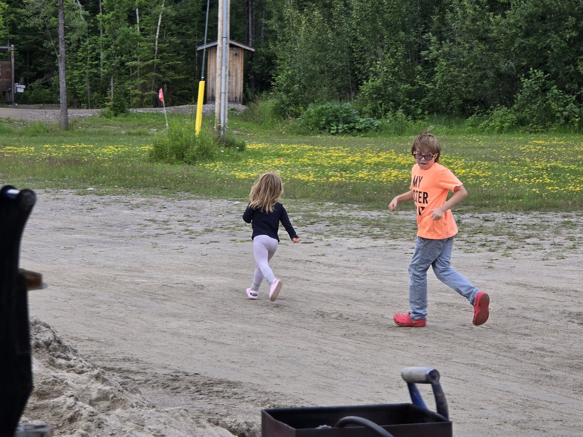 Little cousins playing. Our grandson will play with anyone, regardless of the age.
