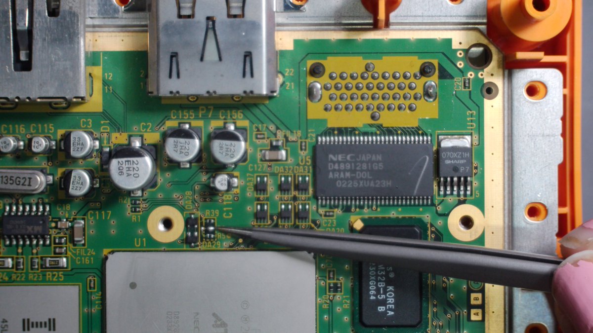 natalie_thenerd's tweet image. Game Cube region swap on a Japanese console. Just bridge R6 which is just above the CPU