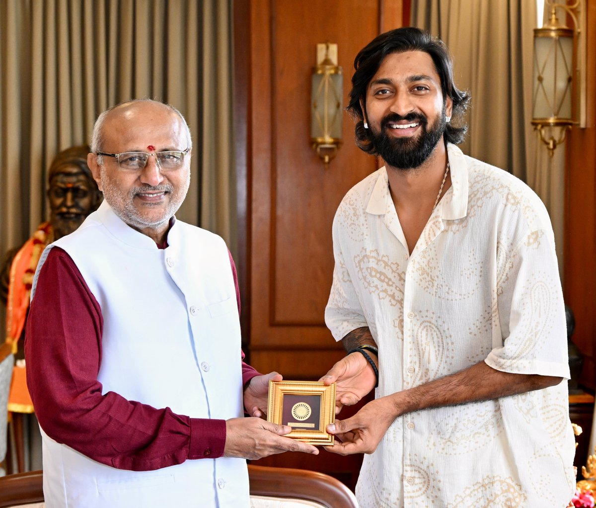 maha_governor's tweet photo. Indian cricket team all-rounders @hardikpandya7 and @krunalpandya24 met Maharashtra Governor C. P. Radhakrishnan at Raj Bhavan, Mumbai. This was a courtesy call. https://t.co/HXtKEWtNRQ
