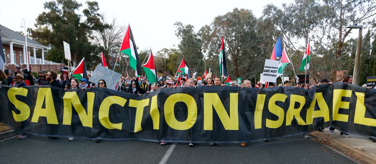 GreenLeftOnline's tweet photo. People came to Canberra from all over the continent for a national convergence to demand that the government Sanction Israel Now! The first rally was on July 20.
Photos: Alex Bainbridge
#gazagenocide #sanctionisraelnow #freepalestine #canberraconvergence #greenleft https://t.co/JMwWZNfq9J