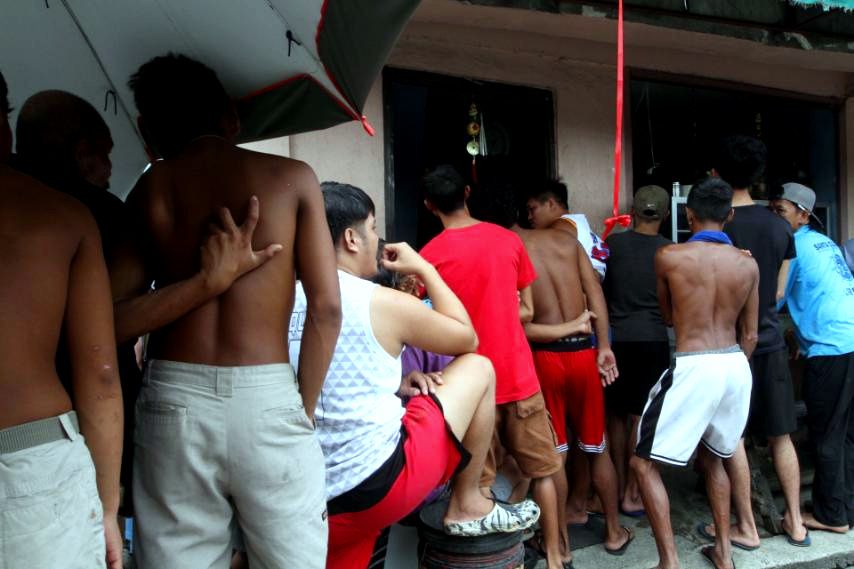 These men from Las Piñas City gather to watch on television eight-time division champion Manny Pacquiao's return to the boxing ring, this time against Mario Barrios for the WBC Welterweight championship fight on Sunday (July 20, 2025).

Pacquiao started strong in the opening two