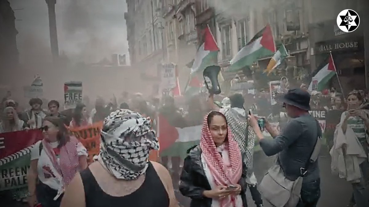 antisemitism's tweet image. Yesterday, Palestine Action’s supporters were out in force, on a day with over 100 arrests. Masked thugs took over the streets in London and towns around the UK once again, firing flares, shouting “f*** your Jewish state” at Jews, and smugly goading officers, daring them to do…