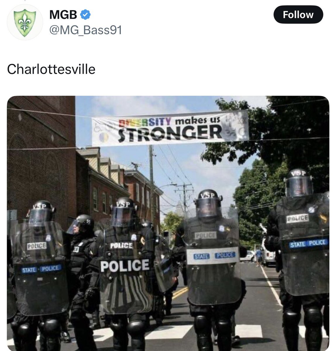 The nonsensical, Orwellian propaganda line “Diversity makes us stronger” enforced by faceless militarized police is not only one of the most iconic images from Unite the Right, but may be the best encapsulation of post Hart-Cellar America ever captured.