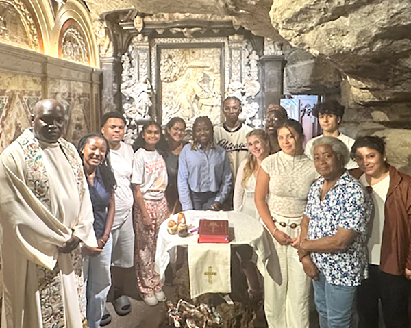 JesuitsEast's tweet image. Fr. Michael Davidson, SJ, recently led a pilgrimage to Spain that visited key Ignatian sites for Boston College students from high financial need backgrounds. The group is pictured having celebrated Mass in the Cave at Manresa where St. Ignatius composed the Spiritual Exercises.