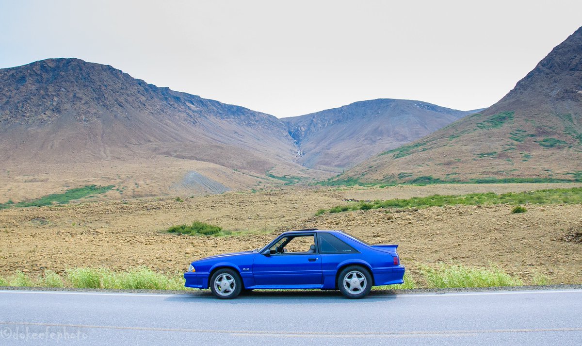 DonnieOK's tweet photo. What a magical surreal place this is!  #Tablelands @ParksCanada #GrosMorne amazing afternoon for a cruise #MustangGT #FoxBody #FoxBodyMustang #FordMustang @FordCanada @FordMustang 1990 just a few years old. #ExploreNL #Newfoundland #Outdoors #ClassicCars https://t.co/ULmBhGPaZd