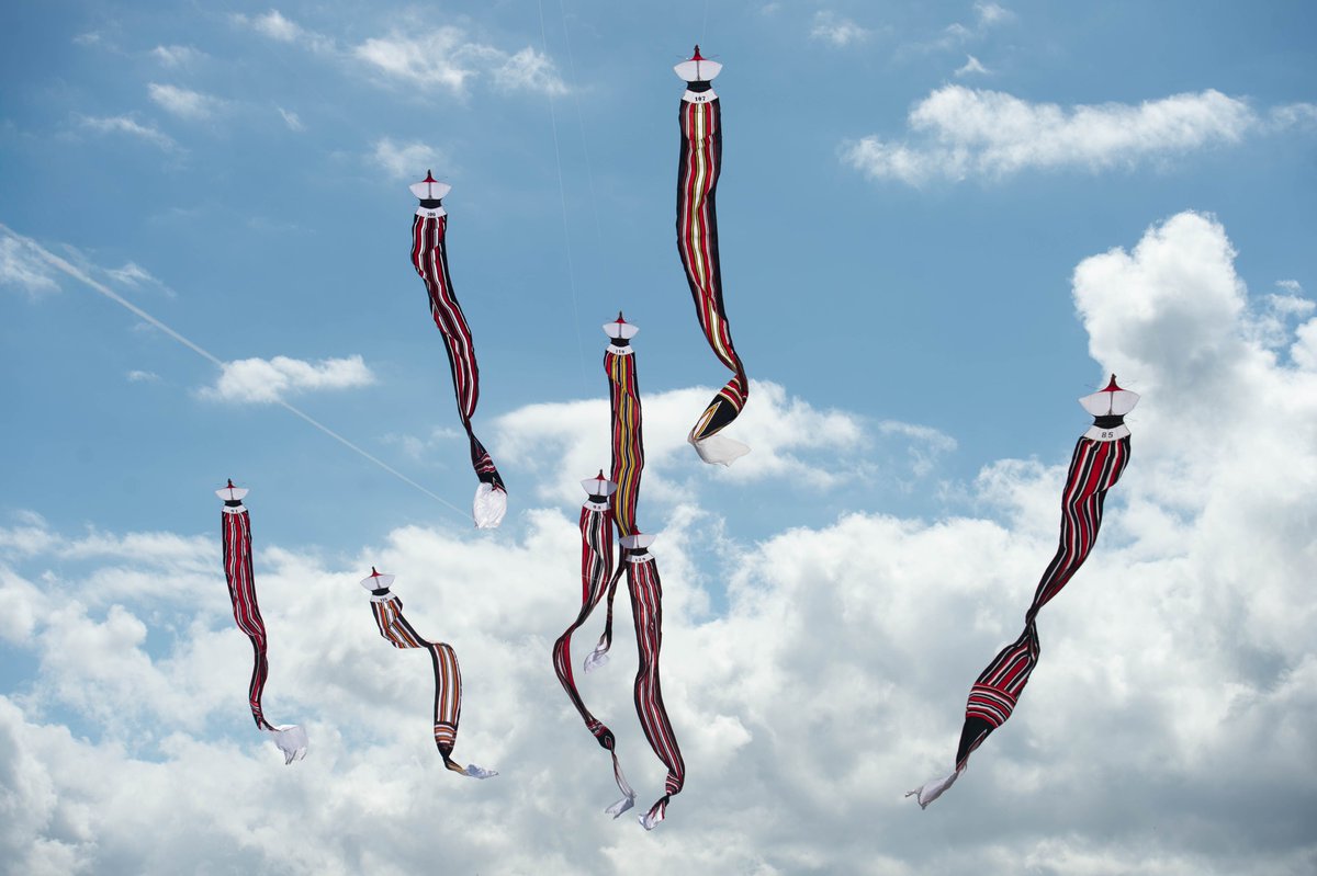 Tibalism's tweet image. Watched giant kites soar at the Bali Kites Festival today! Beautifully crafted with detailed heads (see last pic). They're so big, they could carry people away!